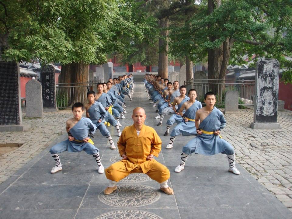 Grandmaster Shi De Yang with warrior monks Shaolin Temple