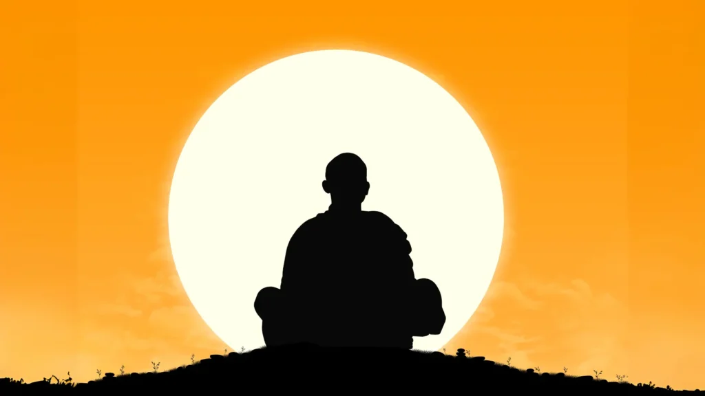Monk meditating silhouette