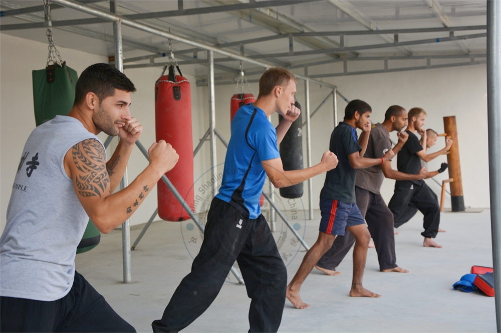 Shaolin Kung Fu Master teaching foreign students sanda