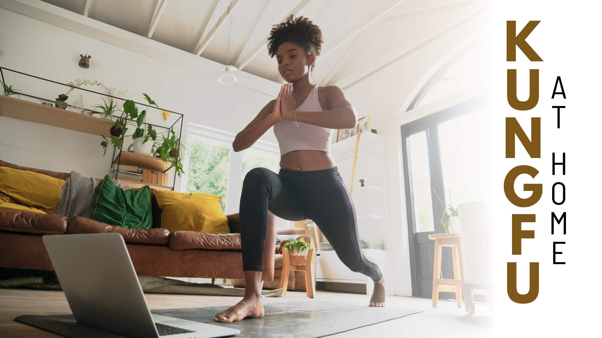 Girl working out in home living room looking at laptop