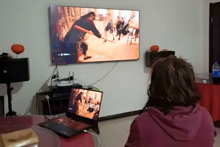 student Daniel playing videogames