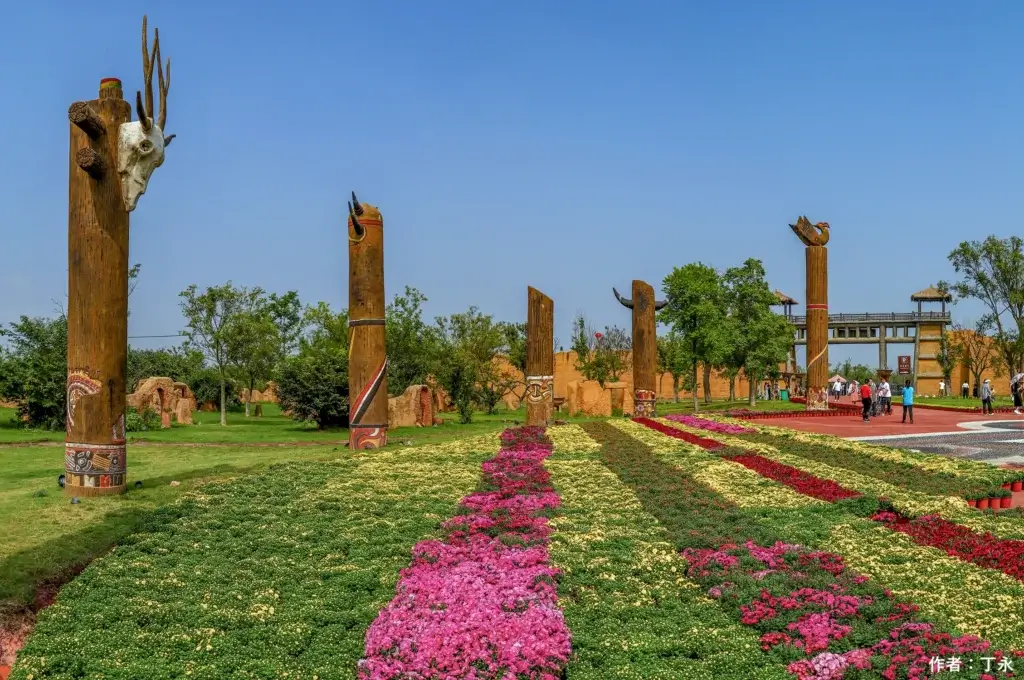 Huating tribal entrance with flowers